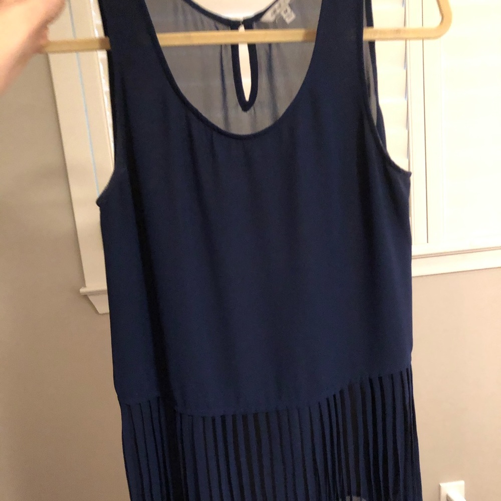 Navy sleeveless blouse with fringe detail